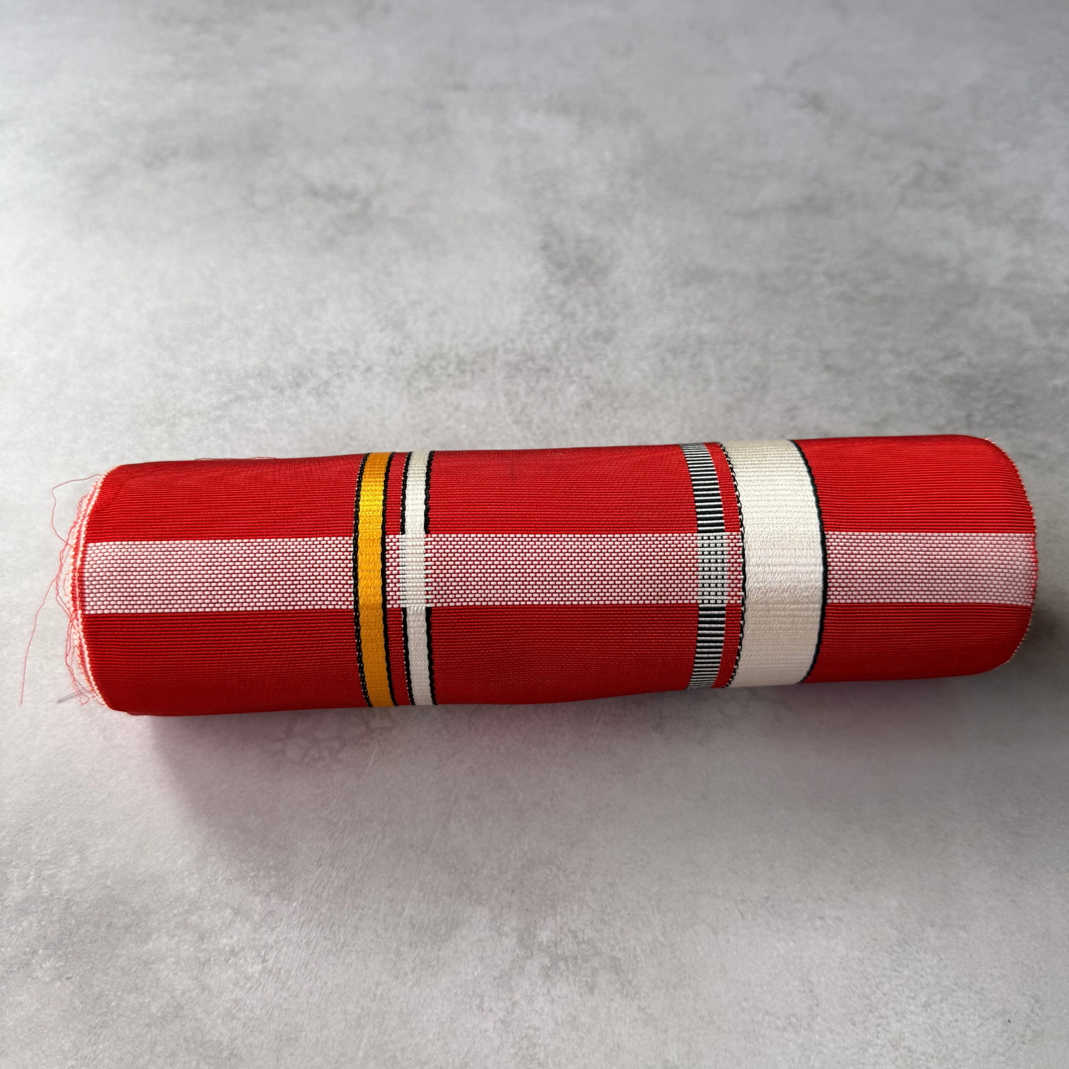 Rolled Japanese red plaid obi fabric for sewing and crafts